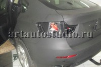 BMW X6 стайлинг плёнками чёрный супермат и карбоновой
